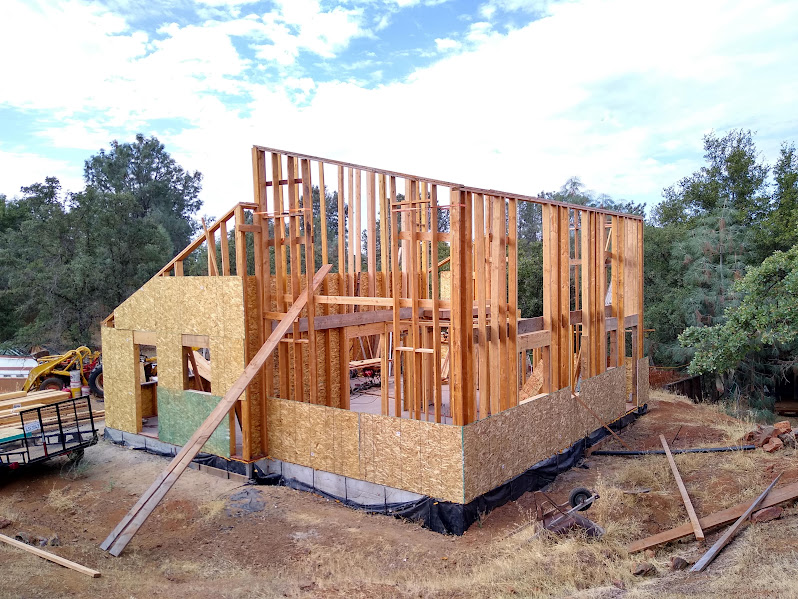 Base preparation with material staging for subgrade and utilities